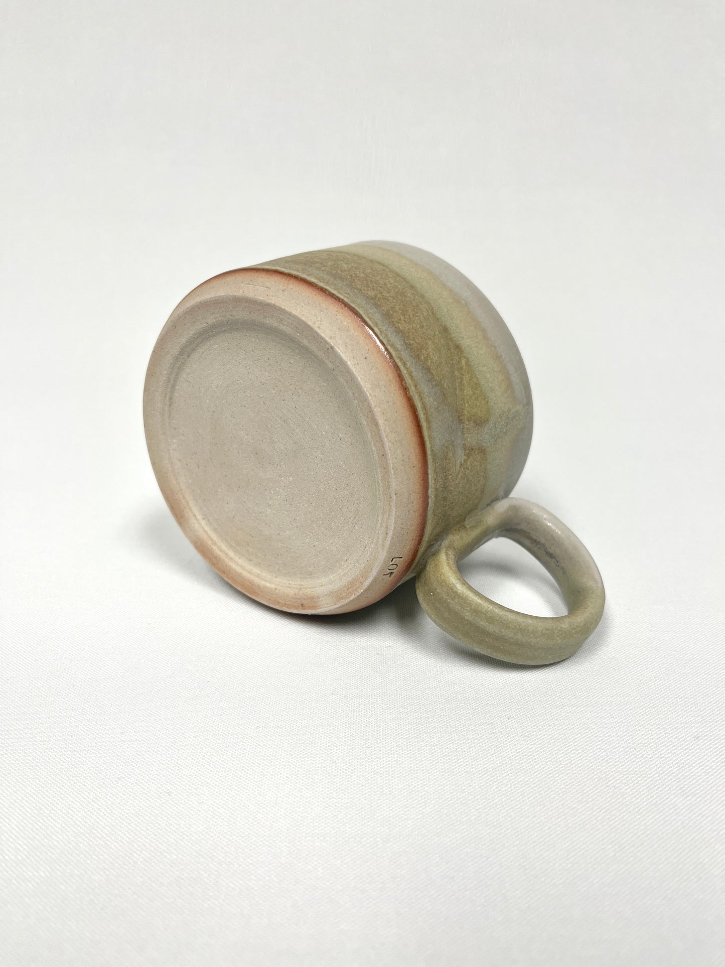 Sandy green Slash Mug by Lynne Mulvhill