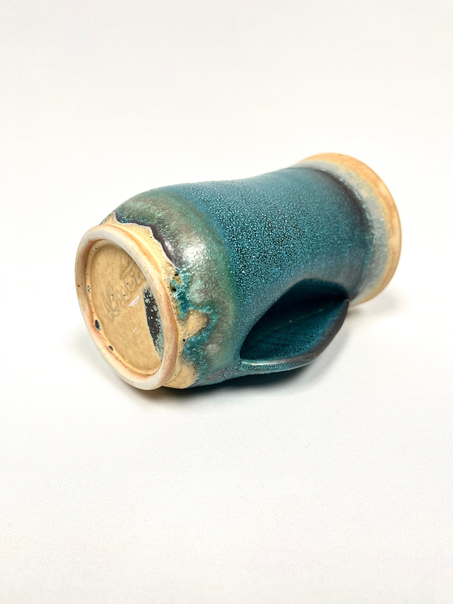 Turquoise Handwarmer Mug by Britta Spiring