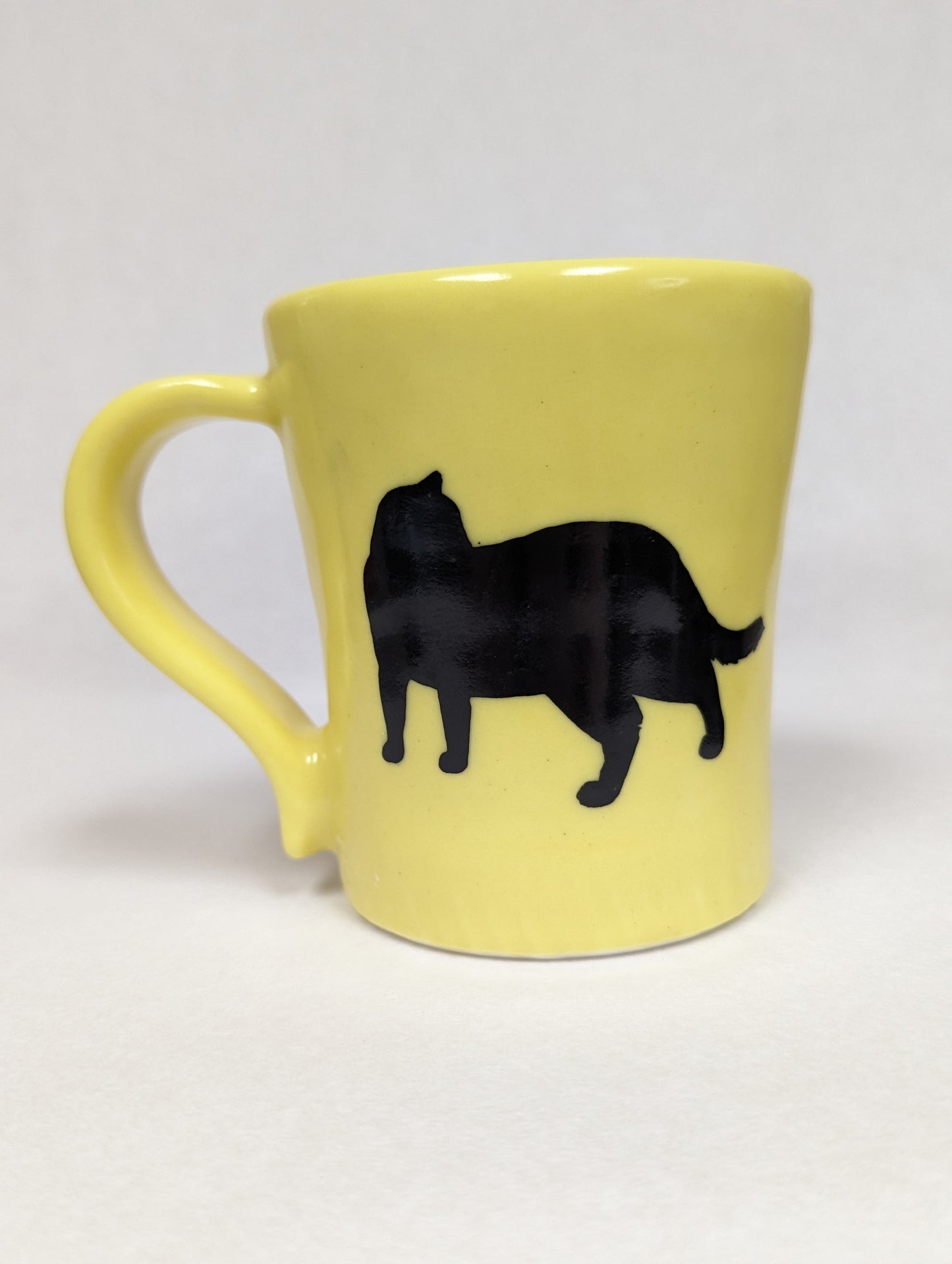 Yellow Cat Mug by Kevin Stafford