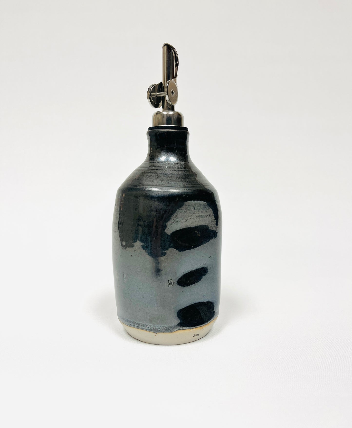 Black oil bottle by Lynne Mulvihill