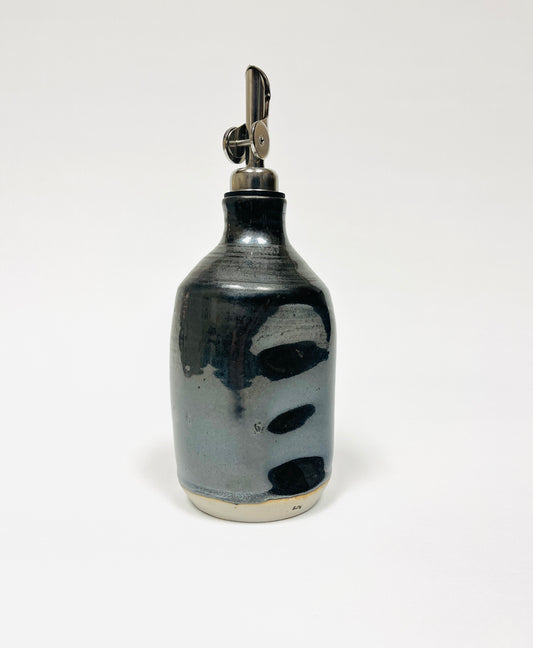 Black oil bottle by Lynne Mulvihill