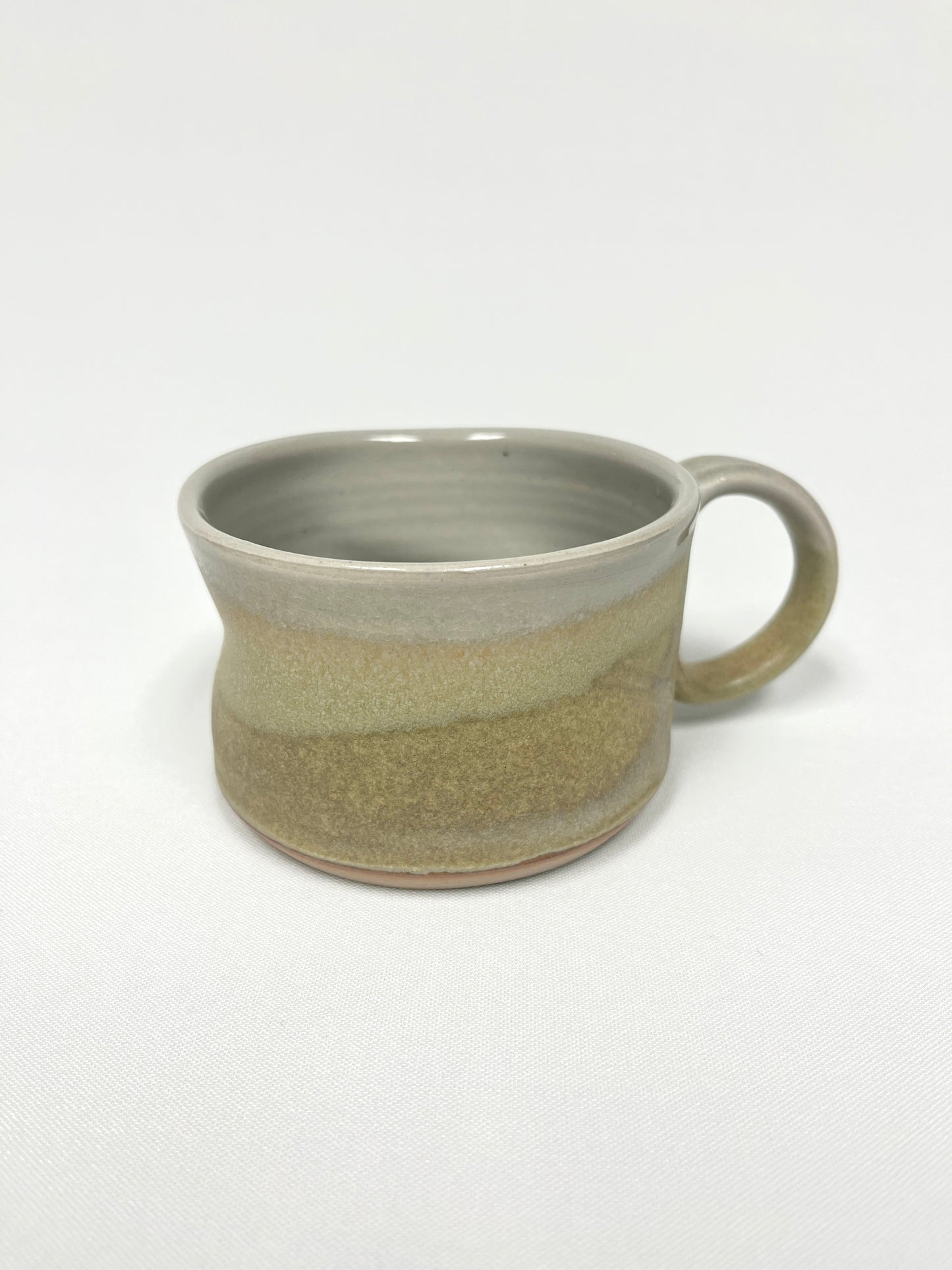 Sandy green Slash Mug by Lynne Mulvhill