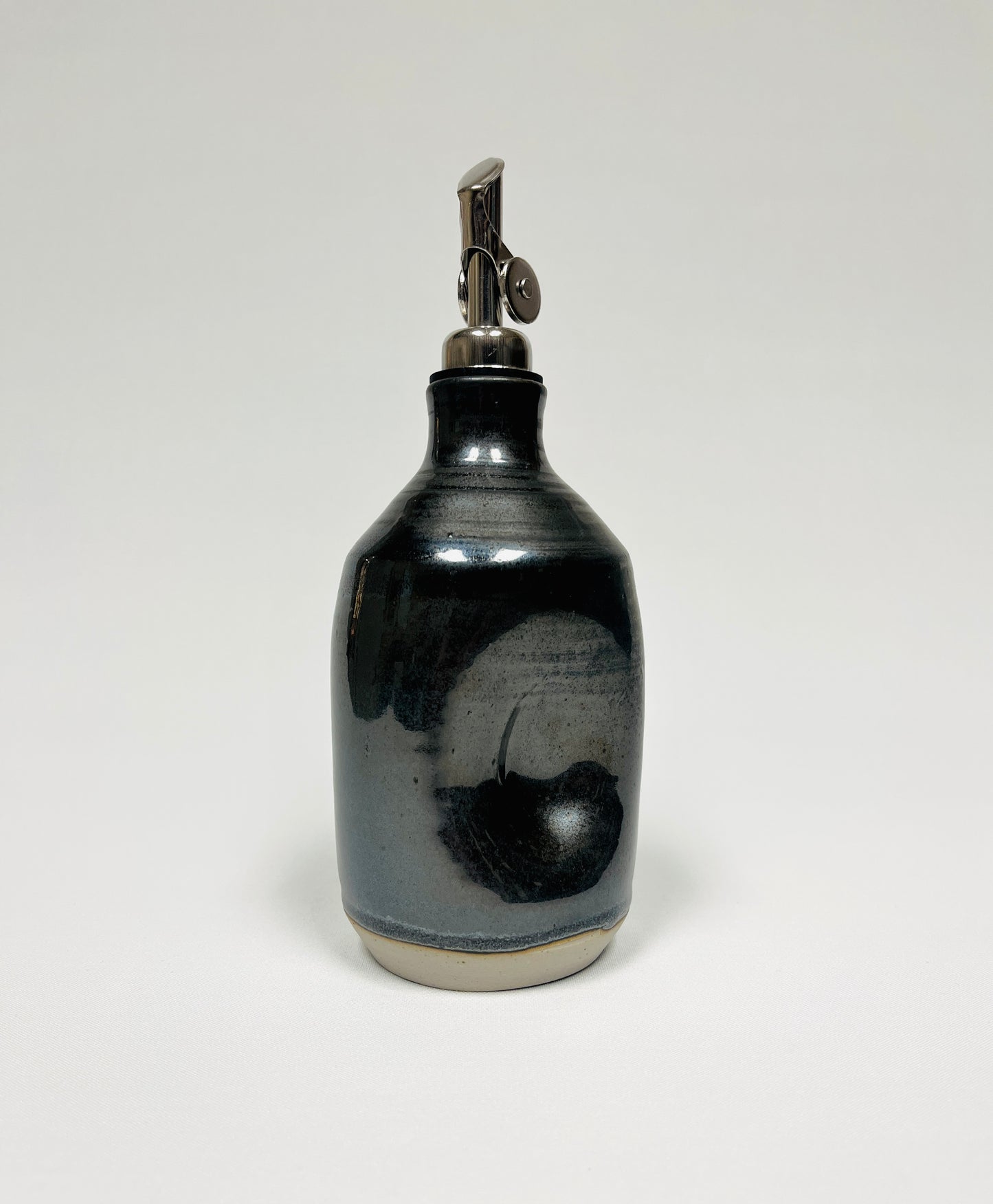 Black oil bottle by Lynne Mulvihill
