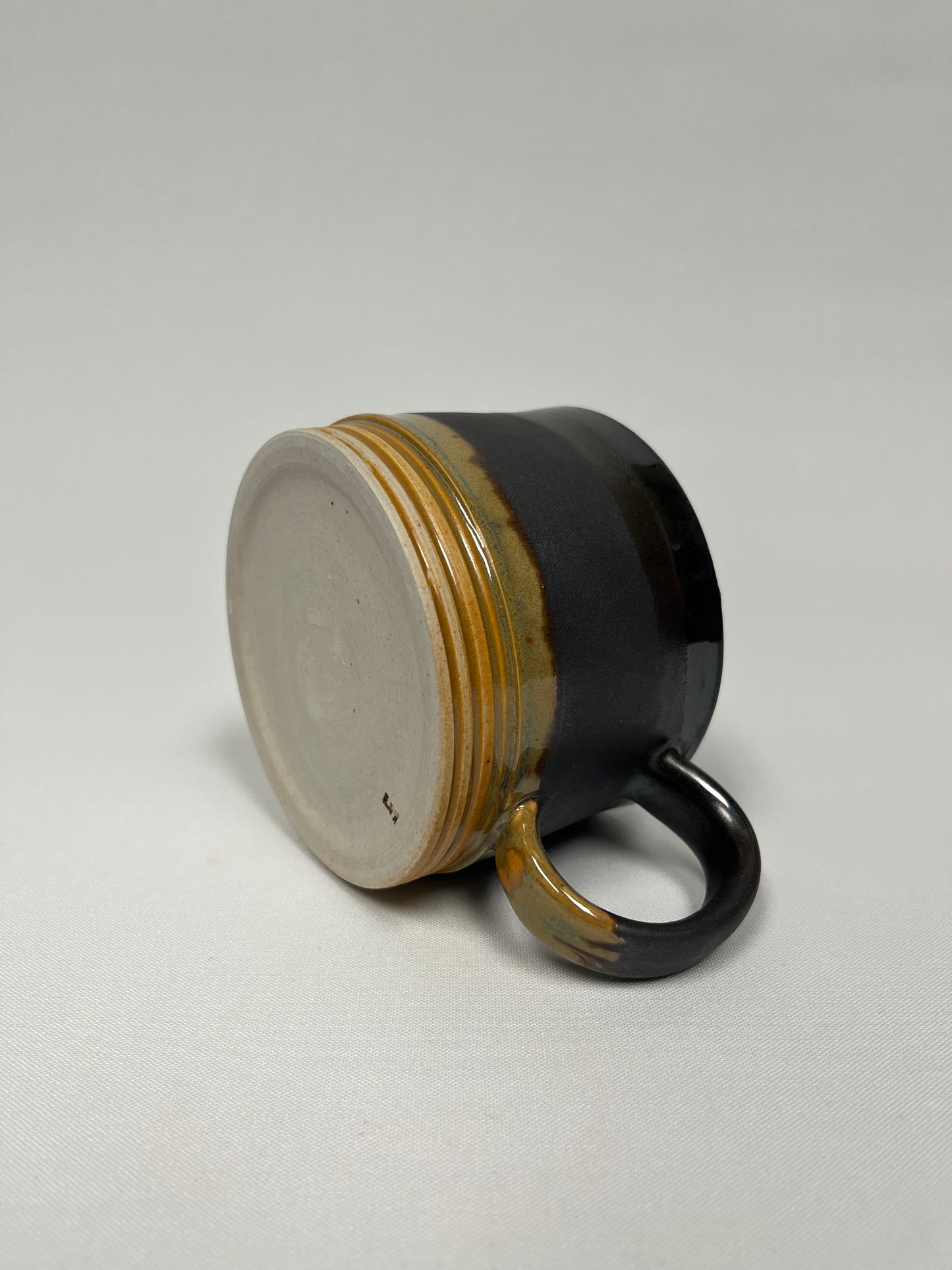 Mustard and metal Mug by Lynne Mulvihill