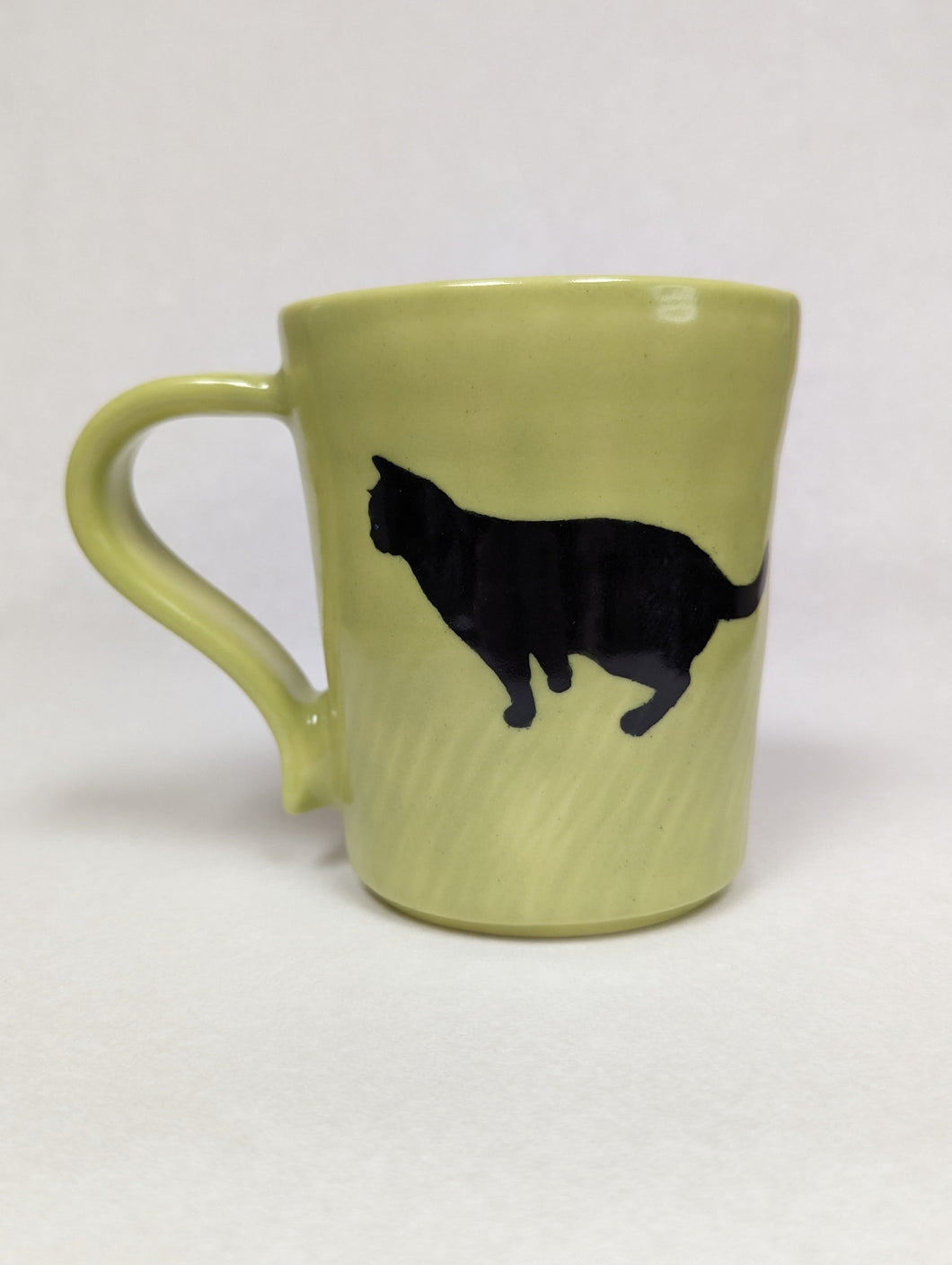Green Cat Mug by Kevin Stafford